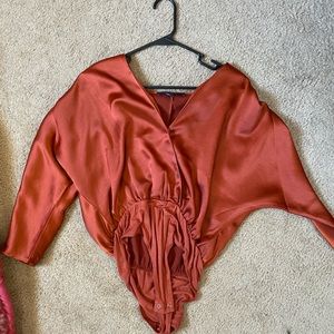 Orange bodysuit